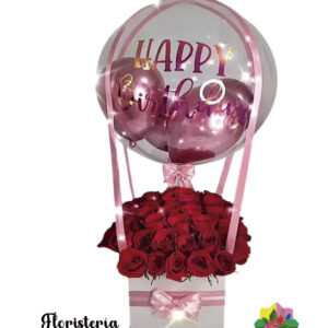 Arreglo floral con globo transparente